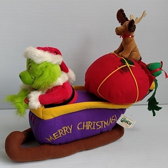 grinch singing plush
